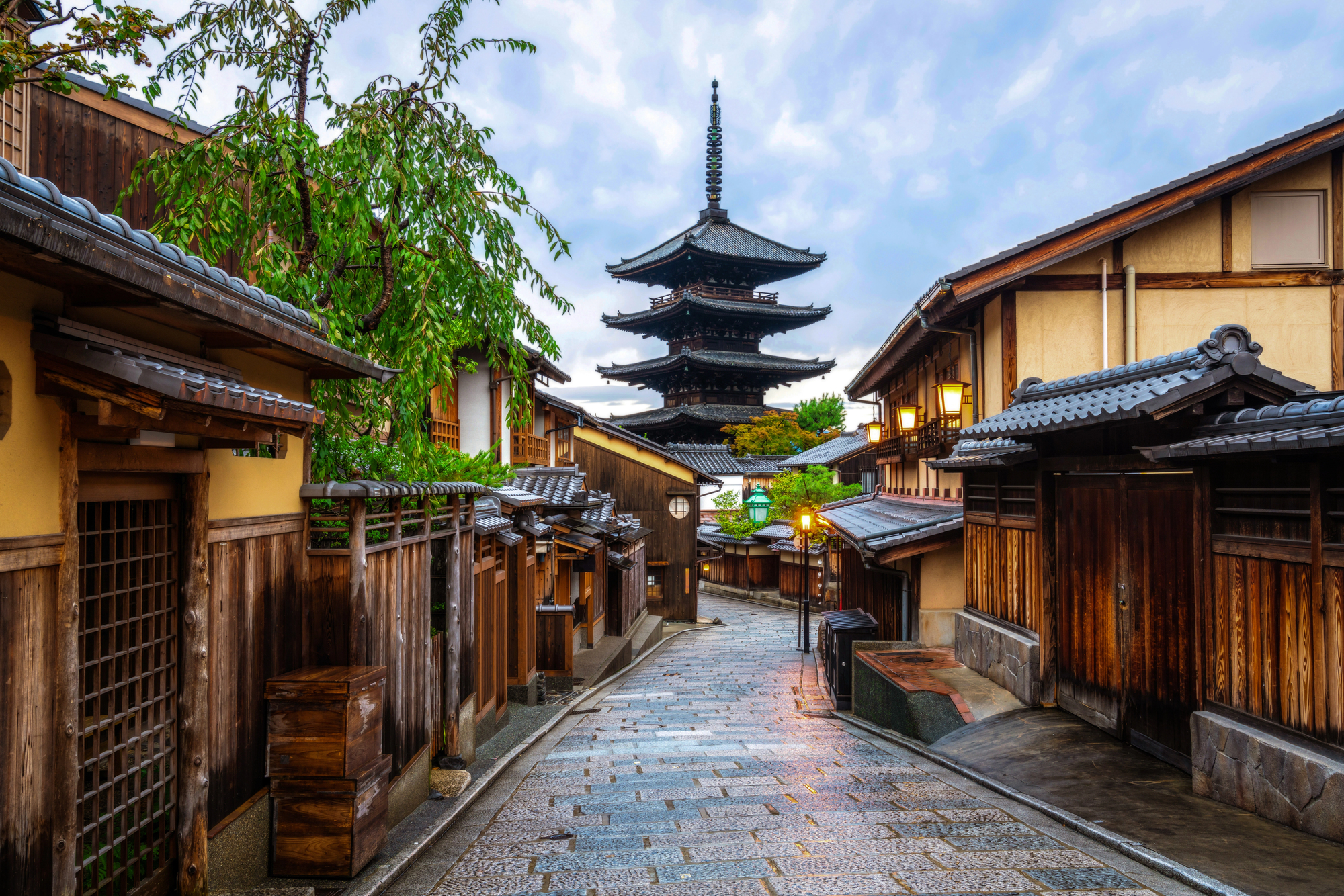 Traditional Kyoto street with historic pagoda and wooden buildings